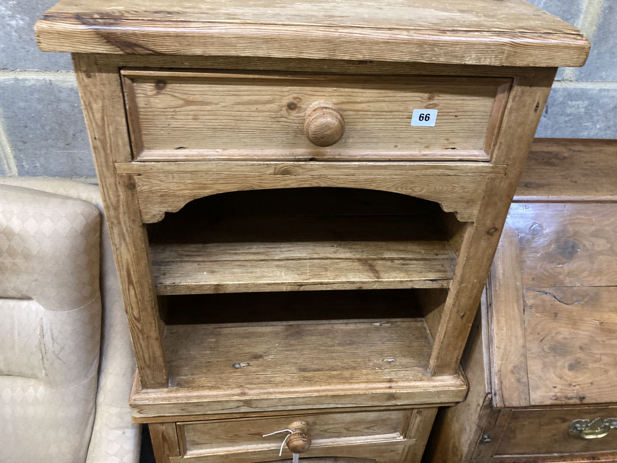 A pair of pine bedside cupboards, width 60cm, depth 38cm, height 67cm